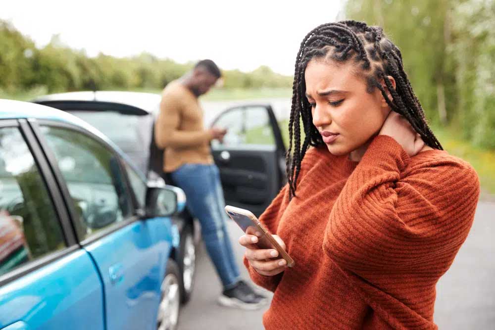 Auto accident victim calling a car accident Lawyer. Car accident lawyers, car accident attorney